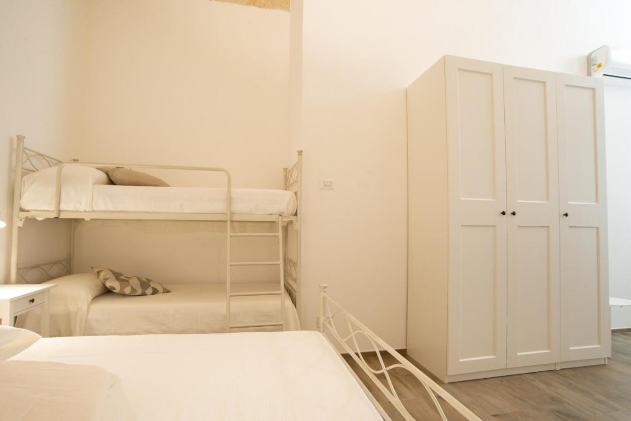 Sun House Rooms Polignano a Mare Bagian luar foto